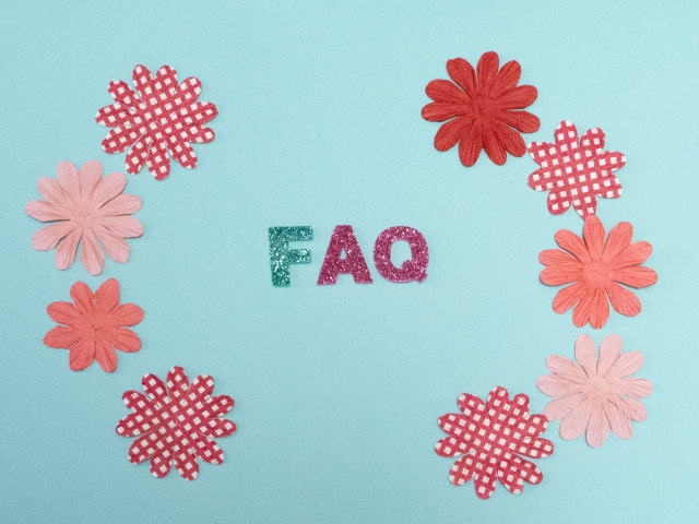 花に囲まれたFAQの画像